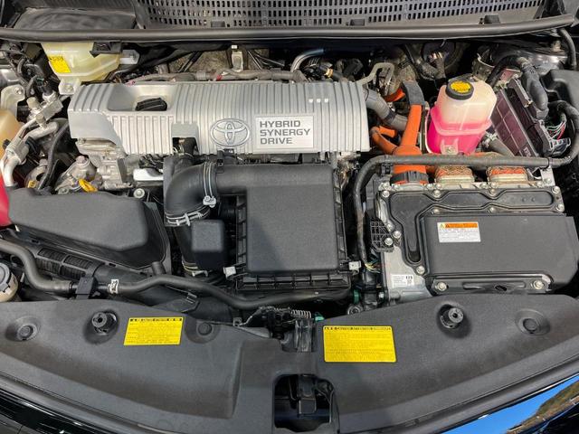 プリウスアルファ Ｓ　チューン　ブラック　純正ナビ　Ｂｌｕｅｔｏｏｔｈ　オプションＬＥＤヘッド　ＥＴＣ車載器　オートエアコン　オートライト　革巻きステリング　メッキドアハンドル　ブラックインテリア　純正１６アルミ　禁煙車（18枚目）