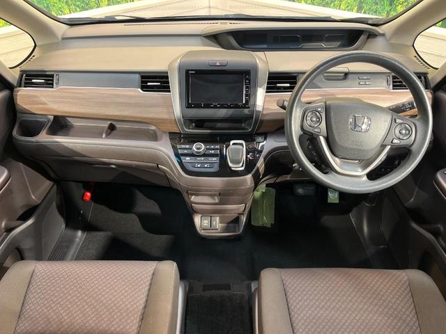 フリードハイブリッド ハイブリッド・Ｇホンダセンシング　ホンダセンシング　純正ナビ　バックカメラ　両側電動ドア　シートヒーター　アダプティブクルーズ　ＬＥＤヘッド　ＥＴＣ　ドラレコ　Ｂｌｕｅｔｏｏｔｈ　ステアリングスイッチ　スマートキー　禁煙車（2枚目）