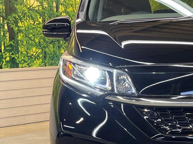 フリードハイブリッド ハイブリッド・Ｇホンダセンシング　ホンダセンシング　純正ナビ　バックカメラ　両側電動ドア　シートヒーター　アダプティブクルーズ　ＬＥＤヘッド　ＥＴＣ　ドラレコ　Ｂｌｕｅｔｏｏｔｈ　ステアリングスイッチ　スマートキー　禁煙車（13枚目）