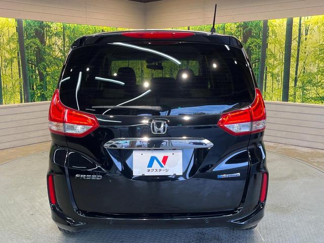 フリードハイブリッド ハイブリッド・Ｇホンダセンシング　ホンダセンシング　純正ナビ　バックカメラ　両側電動ドア　シートヒーター　アダプティブクルーズ　ＬＥＤヘッド　ＥＴＣ　ドラレコ　Ｂｌｕｅｔｏｏｔｈ　ステアリングスイッチ　スマートキー　禁煙車（16枚目）