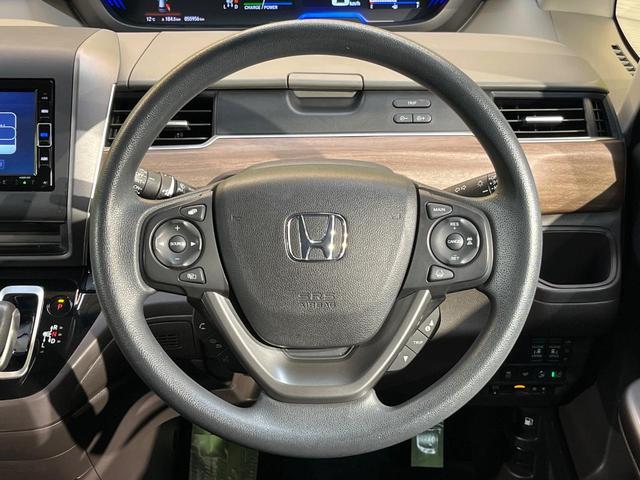 フリードハイブリッド ハイブリッド・Ｇホンダセンシング　ホンダセンシング　純正ナビ　バックカメラ　両側電動ドア　シートヒーター　アダプティブクルーズ　ＬＥＤヘッド　ＥＴＣ　ドラレコ　Ｂｌｕｅｔｏｏｔｈ　ステアリングスイッチ　スマートキー　禁煙車（23枚目）