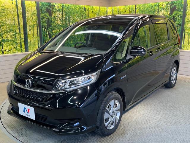 フリードハイブリッド ハイブリッド・Ｇホンダセンシング　ホンダセンシング　純正ナビ　バックカメラ　両側電動ドア　シートヒーター　アダプティブクルーズ　ＬＥＤヘッド　ＥＴＣ　ドラレコ　Ｂｌｕｅｔｏｏｔｈ　ステアリングスイッチ　スマートキー　禁煙車（56枚目）