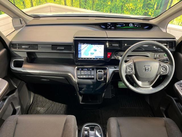 ステップワゴンスパーダ ｅ：ＨＥＶスパーダ　Ｇ　ホンダセンシング　衝突軽減　わくわくゲート　純正９型ナビ　バックカメラ　両側電動ドア　アダプティブクルーズ　Ｂｌｕｅｔｏｏｔｈ　ＥＴＣ　ドラレコ　ステリングスイッチ　ブレーキホールド　ＬＥＤ　純正１６アルミ　禁煙（2枚目）