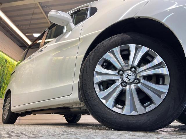 フリード Ｇ　ジャストセレクション　７人乗り　純正ナビ　バックカメラ　Ｂｌｕｅｔｏｏｔｈ　電動スライドドア　ドラレコ　ＥＴＣ　スマートキー　オートエアコン　ＨＩＤヘッド　純正１５アルミ　ステリングスイッチ　ワンオーナー（14枚目）