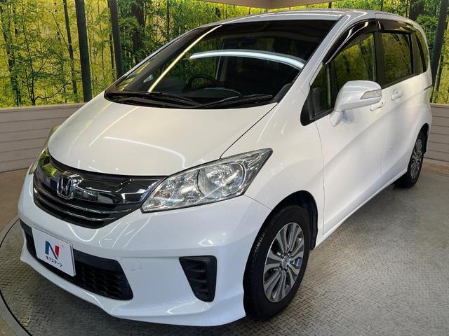 フリード Ｇ　ジャストセレクション　７人乗り　純正ナビ　バックカメラ　Ｂｌｕｅｔｏｏｔｈ　電動スライドドア　ドラレコ　ＥＴＣ　スマートキー　オートエアコン　ＨＩＤヘッド　純正１５アルミ　ステリングスイッチ　ワンオーナー（49枚目）