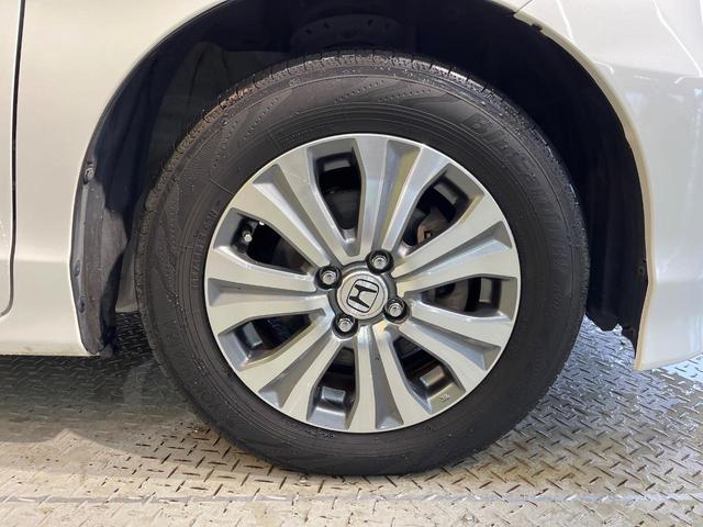 フリード Ｇ　ジャストセレクション　７人乗り　純正ナビ　バックカメラ　Ｂｌｕｅｔｏｏｔｈ　電動スライドドア　ドラレコ　ＥＴＣ　スマートキー　オートエアコン　ＨＩＤヘッド　純正１５アルミ　ステリングスイッチ　ワンオーナー（56枚目）