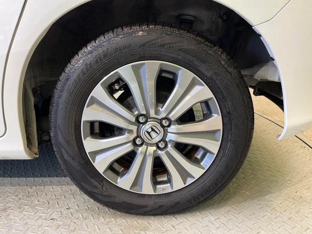 フリード Ｇ　ジャストセレクション　７人乗り　純正ナビ　バックカメラ　Ｂｌｕｅｔｏｏｔｈ　電動スライドドア　ドラレコ　ＥＴＣ　スマートキー　オートエアコン　ＨＩＤヘッド　純正１５アルミ　ステリングスイッチ　ワンオーナー（58枚目）