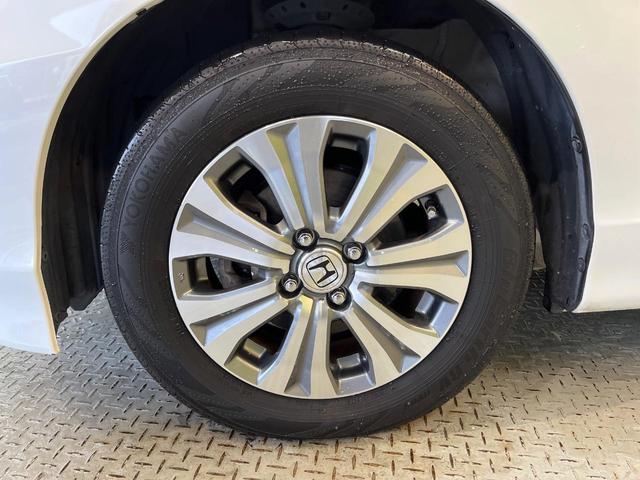 フリード Ｇ　ジャストセレクション　７人乗り　純正ナビ　バックカメラ　Ｂｌｕｅｔｏｏｔｈ　電動スライドドア　ドラレコ　ＥＴＣ　スマートキー　オートエアコン　ＨＩＤヘッド　純正１５アルミ　ステリングスイッチ　ワンオーナー（59枚目）