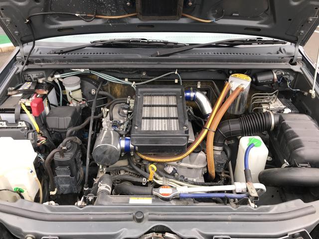 XG 4WD 5MT リフトアップ 社外16AW・マフラー(5枚目)