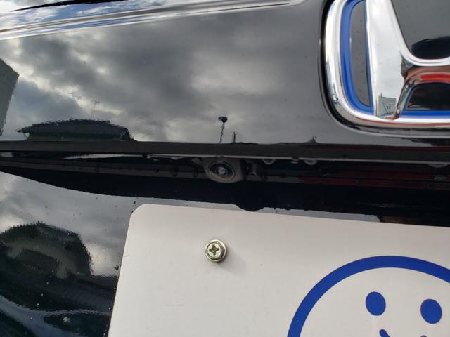 フリード ｅ：ＨＥＶエアー　ＥＸ　登録済未使用車　７人　両側パワースライドドア　純正バックカメラ　シートヒーター　純正１５インチアルミ　ＬＥＤヘッドライト　リアクーラー　純正フロアマット　ドアバイザー　保証書　取説　スペアキー（13枚目）