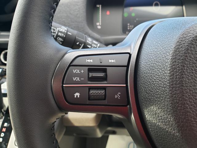 フリード ｅ：ＨＥＶエアー　ＥＸ　登録済未使用車　７人　両側パワースライドドア　純正バックカメラ　シートヒーター　純正１５インチアルミ　ＬＥＤヘッドライト　リアクーラー　純正フロアマット　ドアバイザー　保証書　取説　スペアキー（21枚目）