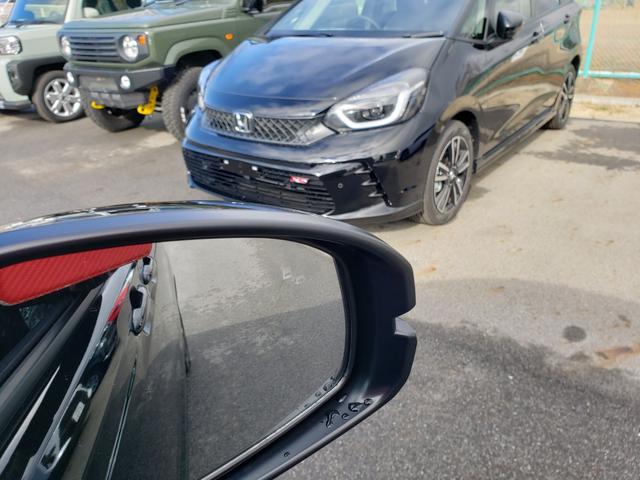 フリード ｅ：ＨＥＶエアー　ＥＸ　登録済未使用車　７人　両側パワースライドドア　純正バックカメラ　シートヒーター　純正１５インチアルミ　ＬＥＤヘッドライト　リアクーラー　純正フロアマット　ドアバイザー　保証書　取説　スペアキー（27枚目）