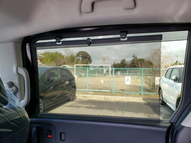 フリード ｅ：ＨＥＶエアー　ＥＸ　登録済未使用車　７人　両側パワースライドドア　純正バックカメラ　シートヒーター　純正１５インチアルミ　ＬＥＤヘッドライト　リアクーラー　純正フロアマット　ドアバイザー　保証書　取説　スペアキー（34枚目）