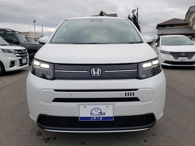 フリード ｅ：ＨＥＶエアー　ＥＸ　登録済未使用車　純正フルセグナビ　バックカメラ　アダプティブクルーズコントロール　後席エアコン　ＬＥＤヘッドライト　クリアランスソナー　シートヒーター　電動パーキング　純正アルミホイール（3枚目）