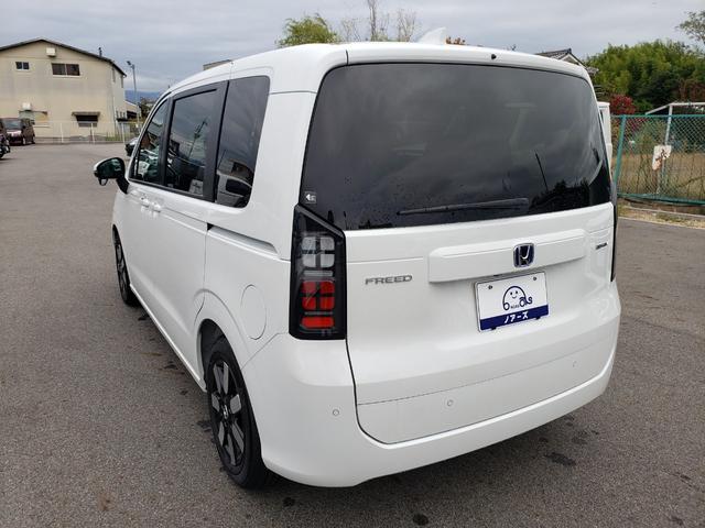 フリード ｅ：ＨＥＶエアー　ＥＸ　登録済未使用車　純正フルセグナビ　バックカメラ　アダプティブクルーズコントロール　後席エアコン　ＬＥＤヘッドライト　クリアランスソナー　シートヒーター　電動パーキング　純正アルミホイール（8枚目）