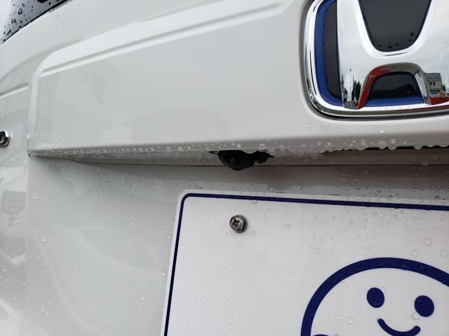 フリード ｅ：ＨＥＶエアー　ＥＸ　登録済未使用車　純正フルセグナビ　バックカメラ　アダプティブクルーズコントロール　後席エアコン　ＬＥＤヘッドライト　クリアランスソナー　シートヒーター　電動パーキング　純正アルミホイール（15枚目）