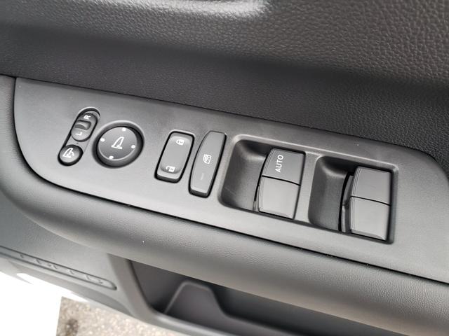 フリード ｅ：ＨＥＶエアー　ＥＸ　登録済未使用車　純正フルセグナビ　バックカメラ　アダプティブクルーズコントロール　後席エアコン　ＬＥＤヘッドライト　クリアランスソナー　シートヒーター　電動パーキング　純正アルミホイール（16枚目）