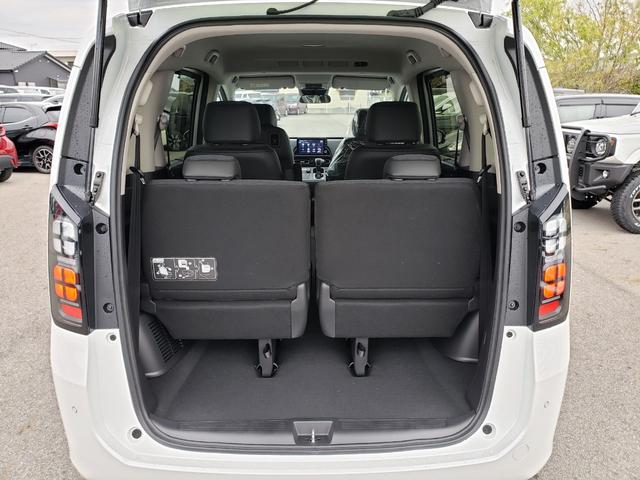 フリード ｅ：ＨＥＶエアー　ＥＸ　登録済未使用車　純正フルセグナビ　バックカメラ　アダプティブクルーズコントロール　後席エアコン　ＬＥＤヘッドライト　クリアランスソナー　シートヒーター　電動パーキング　純正アルミホイール（33枚目）