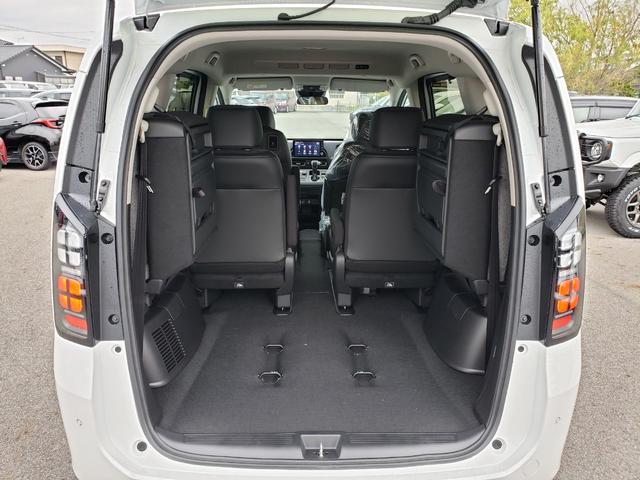 フリード ｅ：ＨＥＶエアー　ＥＸ　登録済未使用車　純正フルセグナビ　バックカメラ　アダプティブクルーズコントロール　後席エアコン　ＬＥＤヘッドライト　クリアランスソナー　シートヒーター　電動パーキング　純正アルミホイール（34枚目）