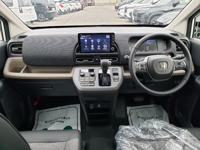 フリード ｅ：ＨＥＶエアー　ＥＸ　登録済未使用車　純正フルセグナビ　バックカメラ　アダプティブクルーズコントロール　後席エアコン　ＬＥＤヘッドライト　クリアランスソナー　シートヒーター　電動パーキング　純正アルミホイール（37枚目）