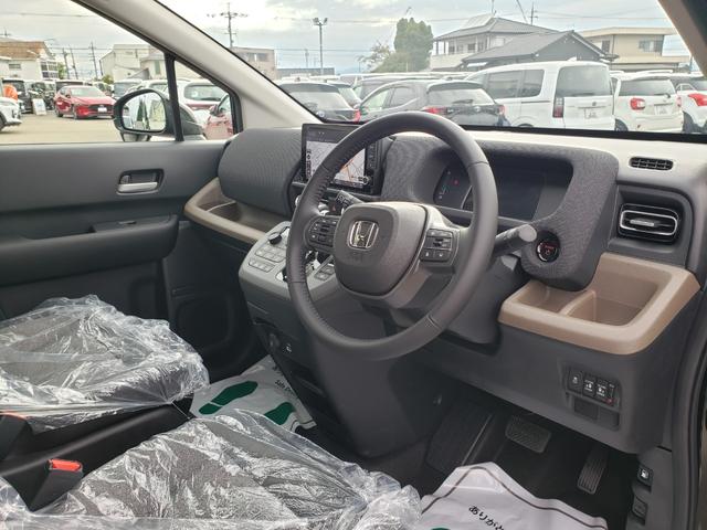 フリード e:HEVエアー EX 登録済未使用車 ホンダ9インチコネクトナビ バックカメラ ホンダセンシング 純正15インチアルミホイール ブラインドスポットモニター シートヒーター サーキュレーター 3列シート オートエアコン(16枚目)
