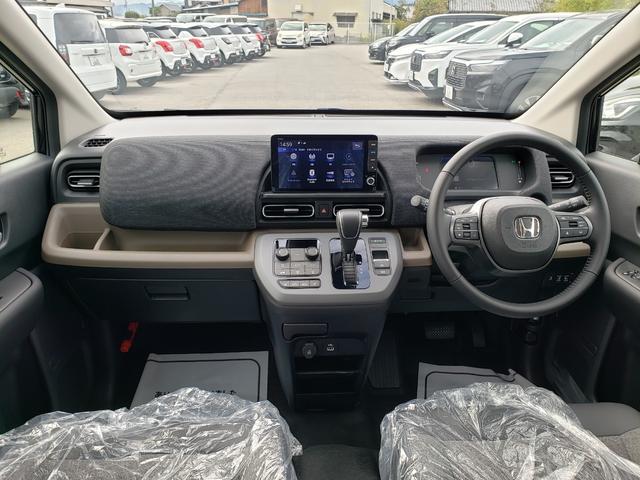 フリード e:HEVエアー EX 登録済未使用車 ホンダ9インチコネクトナビ バックカメラ ホンダセンシング 純正15インチアルミホイール ブラインドスポットモニター シートヒーター サーキュレーター 3列シート オートエアコン(34枚目)