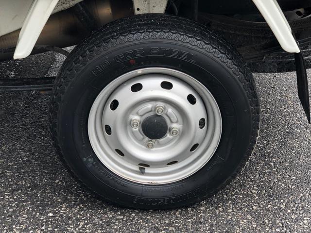 エアコン・パワステ スペシャル 4WD・エアコン・パワステ・5速MT・荷台三方開・ラバーマット・純正フロアマット&ドアバイザー・純正オーディオ・FMラジオ・ヘッドライトレベライザー・走行距離1万km台(31枚目)
