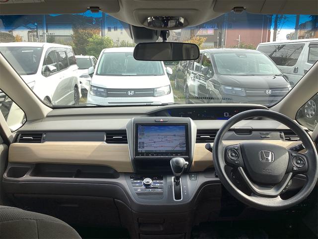 フリード G・ホンダセンシング ETC バックカメラ ナビ TV オートクルーズコントロール レーンアシスト 衝突被害軽減システム 両側電動スライドドア スマートキー アイドリングストップ 電動格納ミラー 3列シート CVT CD(5枚目)