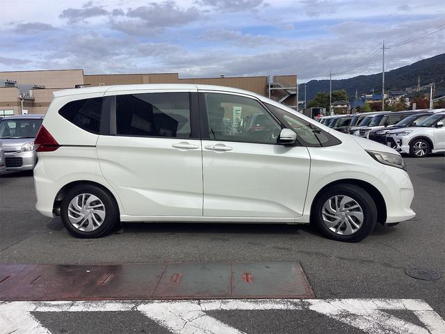 フリード G・ホンダセンシング ETC バックカメラ ナビ TV オートクルーズコントロール レーンアシスト 衝突被害軽減システム 両側電動スライドドア スマートキー アイドリングストップ 電動格納ミラー 3列シート CVT CD(18枚目)