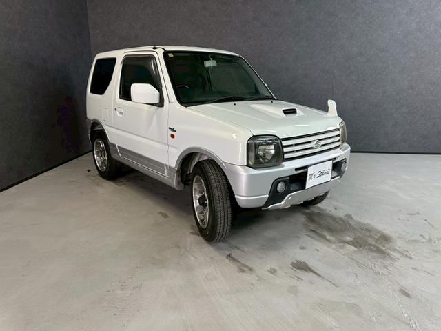 ジムニー ワイルドウインド　車検９年１０月　ターボ　４ＷＤ　５ＭＴ　マニュアルギヤシフト　ＣＤ　ＭＤ　カセット　ＡＢＳ　ＳＲＳエアバッグ　パワステ　パワーウィンドウ　シートヒーター　アルミホイール　フォグランプ（8枚目）