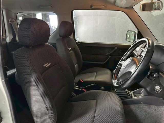 ジムニー ワイルドウインド　車検９年１０月　ターボ　４ＷＤ　５ＭＴ　マニュアルギヤシフト　ＣＤ　ＭＤ　カセット　ＡＢＳ　ＳＲＳエアバッグ　パワステ　パワーウィンドウ　シートヒーター　アルミホイール　フォグランプ（35枚目）