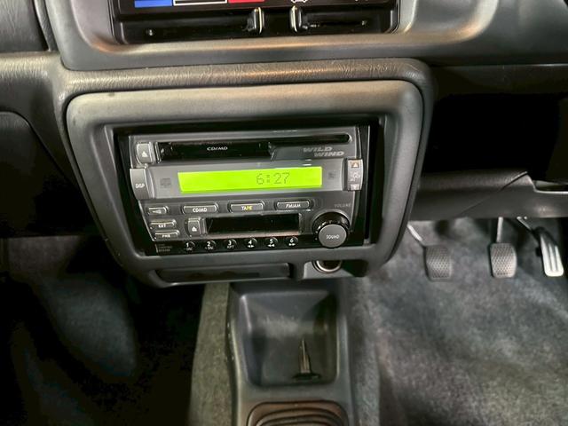 ジムニー ワイルドウインド　車検９年１０月　ターボ　４ＷＤ　５ＭＴ　マニュアルギヤシフト　ＣＤ　ＭＤ　カセット　ＡＢＳ　ＳＲＳエアバッグ　パワステ　パワーウィンドウ　シートヒーター　アルミホイール　フォグランプ（55枚目）