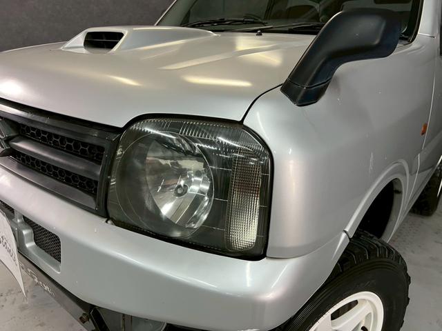 ジムニー ＸＧ　車検９年１０月　ターボ　４ＷＤ　５ＭＴ　マニュアルギヤシフト　キーレス　ＣＤ　ＡＢＳ　ＳＲＳエアバッグ　パワステ　パワーウィンドウ　リフトアップ　アルミホイール（19枚目）
