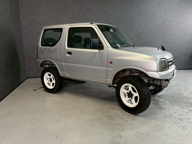 ジムニー ＸＧ　車検９年１０月　ターボ　４ＷＤ　５ＭＴ　マニュアルギヤシフト　キーレス　ＣＤ　ＡＢＳ　ＳＲＳエアバッグ　パワステ　パワーウィンドウ　リフトアップ　アルミホイール（48枚目）