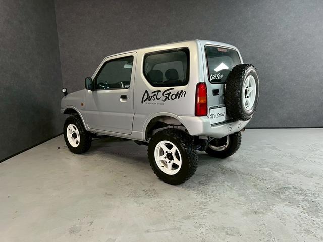 ジムニー ＸＧ　車検９年１０月　ターボ　４ＷＤ　５ＭＴ　マニュアルギヤシフト　キーレス　ＣＤ　ＡＢＳ　ＳＲＳエアバッグ　パワステ　パワーウィンドウ　リフトアップ　アルミホイール（58枚目）