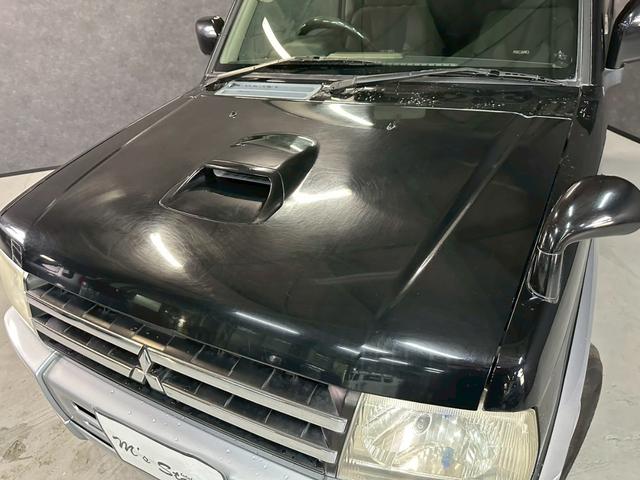 パジェロミニ ＶＲ－Ｓ　車検９年２月　ターボ　４ＷＤ　オートギヤシフト　キーレス　スペアーキー　ナビ　ＡＢＳ　ＳＲＳエアバッグ　レカロシート　ヘッドライトレベライザー　パワステ　パワーウィンドウ　フォグランプ　アルミホイール（22枚目）