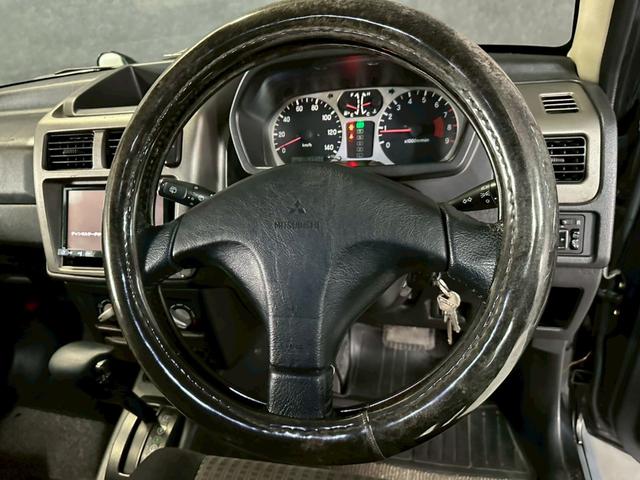 パジェロミニ ＶＲ－Ｓ　車検９年２月　ターボ　４ＷＤ　オートギヤシフト　キーレス　スペアーキー　ナビ　ＡＢＳ　ＳＲＳエアバッグ　レカロシート　ヘッドライトレベライザー　パワステ　パワーウィンドウ　フォグランプ　アルミホイール（26枚目）