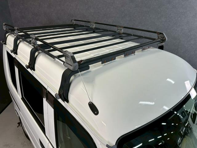 エブリイ ＰＣ　車検９年１１月　４ＷＤ　オートギヤシフト　キーレス　ナビ　ＡＢＳ　ＳＲＳエアバッグ　ヘッドライトレベライザー　パワステ　パワーウィンドウ　ルーフキャリア　３ＡＴ（29枚目）