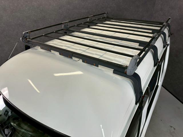 エブリイ ＰＣ　車検９年１１月　４ＷＤ　オートギヤシフト　キーレス　ナビ　ＡＢＳ　ＳＲＳエアバッグ　ヘッドライトレベライザー　パワステ　パワーウィンドウ　ルーフキャリア　３ＡＴ（36枚目）