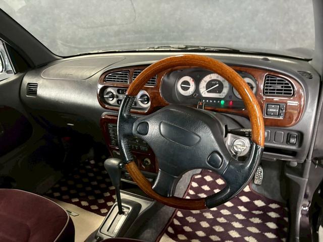 ミラジーノ ジーノ　Ｓエディション　車検９年１１月　オートギヤシフト　キー２本　ＣＤ　カセット　ＡＢＳ　ＳＲＳエアバッグ　パワステ　パワーウィンドウ　アルミホイール　フォグランプ　２ＷＤ　４ＡＴ（12枚目）