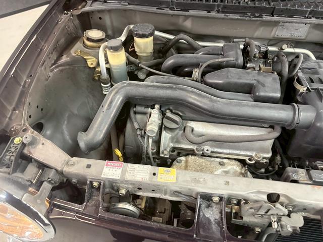 ミラジーノ ジーノ　車検９年２月　オートギヤシフト　ＣＤ　カセット　ＡＢＳ　ＳＲＳエアバッグ　パワステ　パワーウィンドウ　アルミホイール　２ＷＤ　４ＡＴ（13枚目）