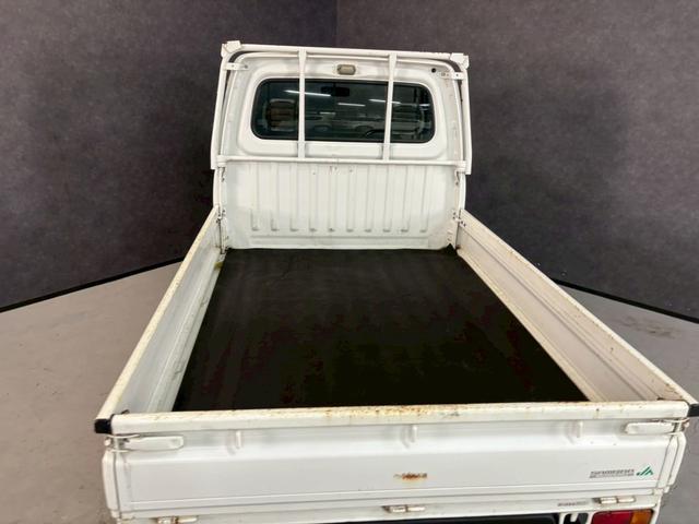 サンバートラック ＴＣ　車検９年１２月　５ＭＴ　マニュアルギヤシフト　エアコン　オーディオ（23枚目）