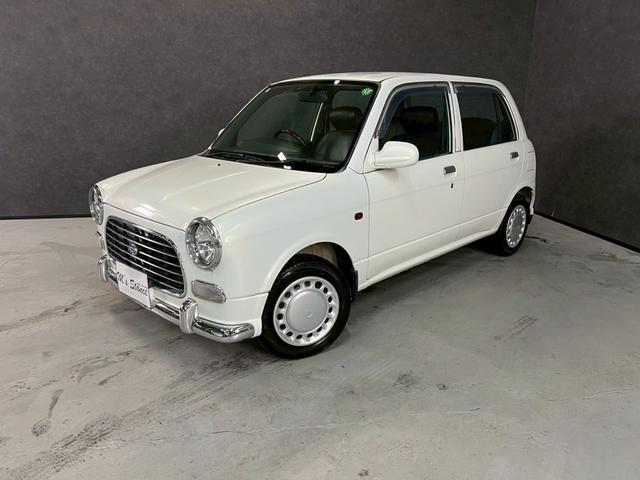 ミラジーノ ジーノ　車検９年１１月　５ＭＴ　マニュアルギヤシフト　キーレス　カセット　ＳＲＳエアバッグ　パワステ　パワーウィンドウ　シートカバー　２ＷＤ（6枚目）