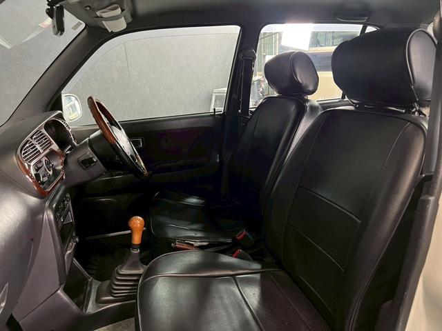 ミラジーノ ジーノ　車検９年１１月　５ＭＴ　マニュアルギヤシフト　キーレス　カセット　ＳＲＳエアバッグ　パワステ　パワーウィンドウ　シートカバー　２ＷＤ（15枚目）