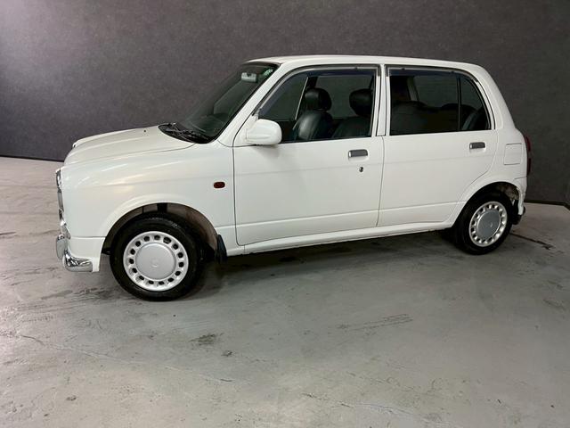 ミラジーノ ジーノ　車検９年１１月　５ＭＴ　マニュアルギヤシフト　キーレス　カセット　ＳＲＳエアバッグ　パワステ　パワーウィンドウ　シートカバー　２ＷＤ（22枚目）