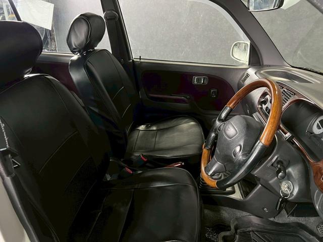 ミラジーノ ジーノ　車検９年１１月　５ＭＴ　マニュアルギヤシフト　キーレス　カセット　ＳＲＳエアバッグ　パワステ　パワーウィンドウ　シートカバー　２ＷＤ（23枚目）