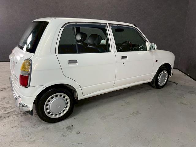 ミラジーノ ジーノ　車検９年１１月　５ＭＴ　マニュアルギヤシフト　キーレス　カセット　ＳＲＳエアバッグ　パワステ　パワーウィンドウ　シートカバー　２ＷＤ（27枚目）