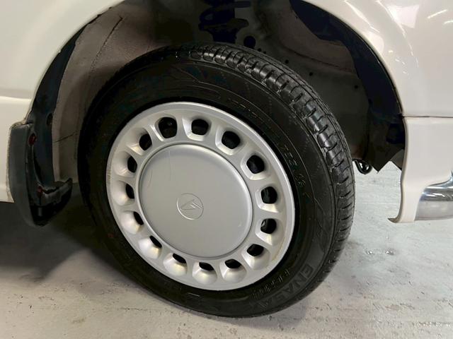 ミラジーノ ジーノ　車検９年１１月　５ＭＴ　マニュアルギヤシフト　キーレス　カセット　ＳＲＳエアバッグ　パワステ　パワーウィンドウ　シートカバー　２ＷＤ（28枚目）