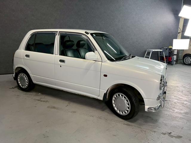 ミラジーノ ジーノ　車検９年１１月　５ＭＴ　マニュアルギヤシフト　キーレス　カセット　ＳＲＳエアバッグ　パワステ　パワーウィンドウ　シートカバー　２ＷＤ（39枚目）