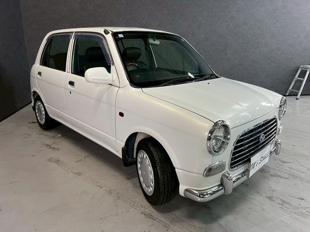 ミラジーノ ジーノ　車検９年１１月　５ＭＴ　マニュアルギヤシフト　キーレス　カセット　ＳＲＳエアバッグ　パワステ　パワーウィンドウ　シートカバー　２ＷＤ（52枚目）